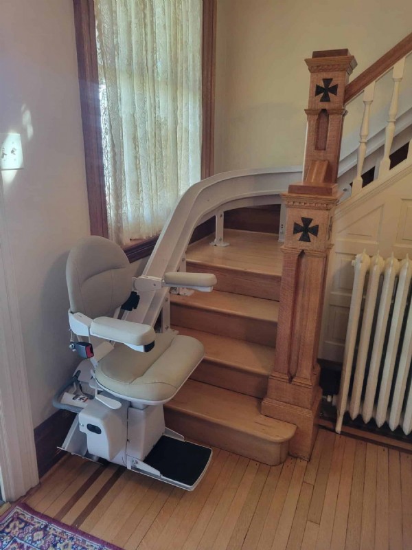 Bruno curved stairlift with tan upholstery installed by Lifeway Mobility in Harrisburg PA